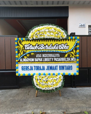 Papan Bunga Duka di Pebayuran